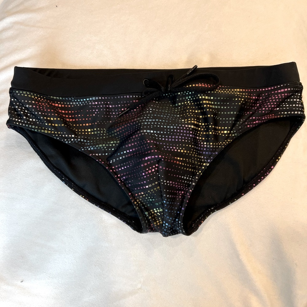 TEAM8 swim brief, black with shimmery colors, men’s size small.